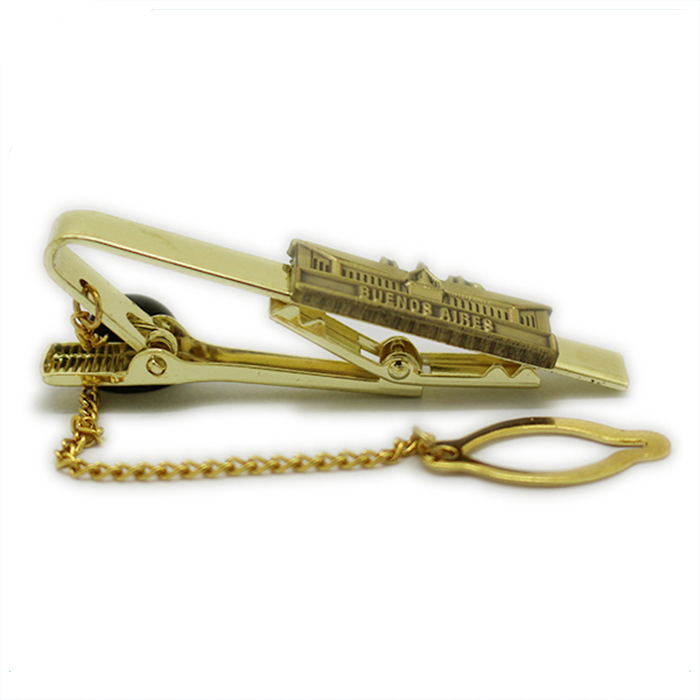 Pasador de corbata de metal con diseño de edificio dorado antiguo modelo 3d