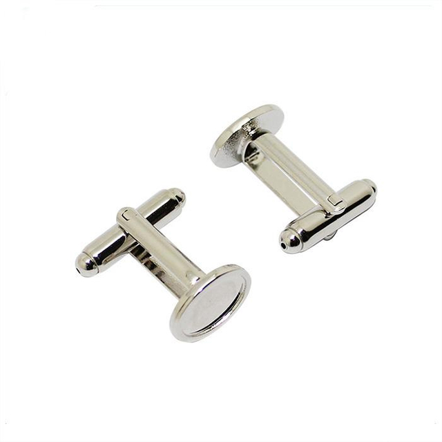 Gemelos de metal en blanco con forma redonda plateada